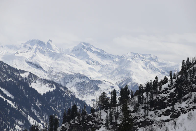 A snow-covered mountain range in Himachal.